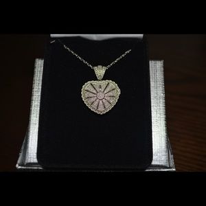 Diamond Locket set in sterling silver 1/4 total Diamond weight